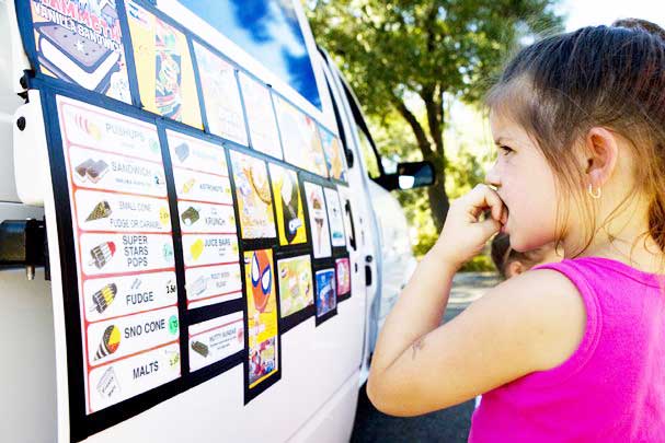 Little girl orders ice cream