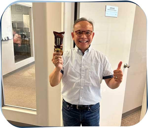 Executive eats ice cream on his way to a meeting