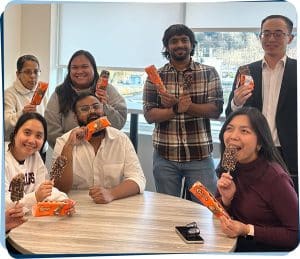 TransCold staff enjoying complimentary sweet treats